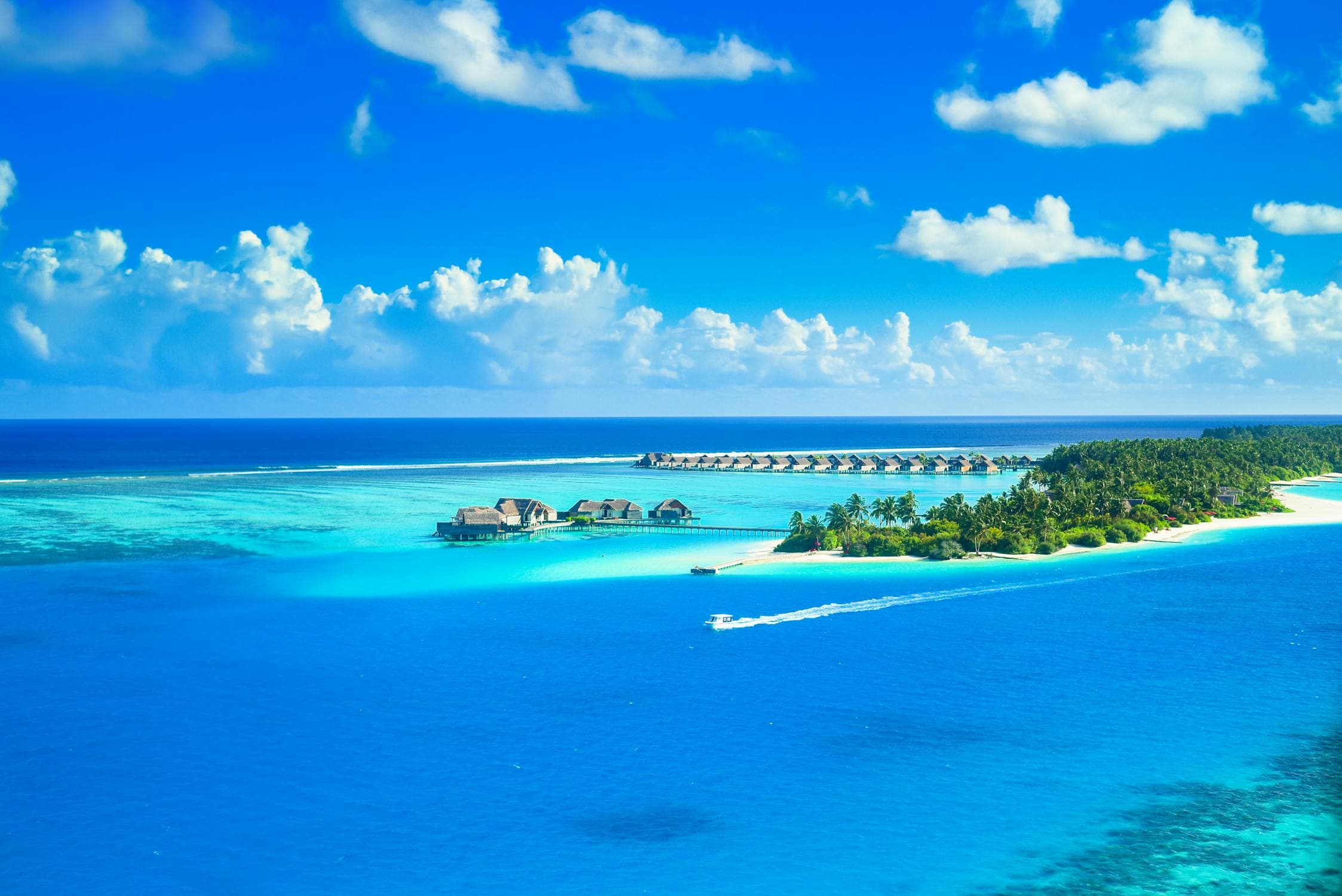 Maldives vs Seychelles Honeymoon 2026: Overwater Villas vs Granite Beaches